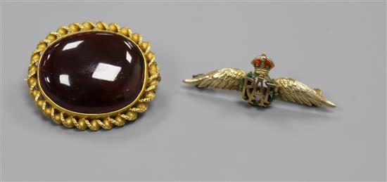 A Victorian yellow metal and cabochon garnet set oval brooch and a later 9ct gold and enamel sweethearts brooch, garnet brooch 31mm.
